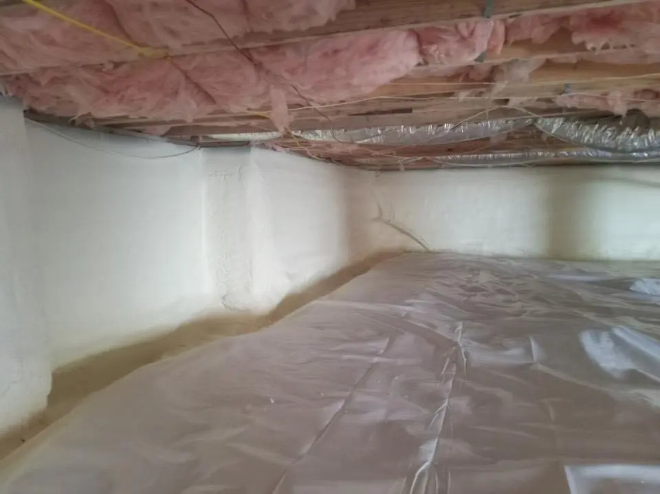 Crawl space encapsulation with closed-cell spray foam for Commercial Roof Restoration in Golden